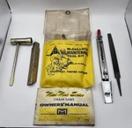 Mcculloch Chain Saw Tool Kit & Literature - Scrench Mini Mac Used 84904. Price: $16.50.