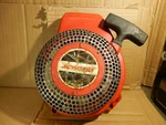Genuine Jonsered 70E 66E Rewind Starter / Recoil 01-21 504600121 Used. Price: $70.00.