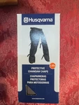 Husqvarna Gray Chainsaw Chaps Protective Legs Adjustable Waist 531309503 Nib New. Price: $65.00.