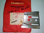 Homelite Chainsaw, Part# 67300-C. Guide Bar Plate, Super Ez, Inner Open. Price: $10.00.