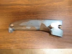 Homelite XL-101 Chainsaw Trigger Handle Half Used. Price: $12.00.
